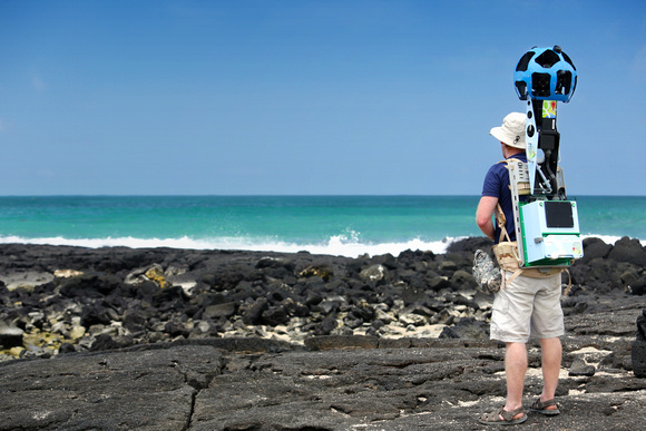 Daniel Orellana of the Charles Darwin Foundation collectingseashore imagery with the Street View Trekker at the LosHumedales wetland area on Isabela island.